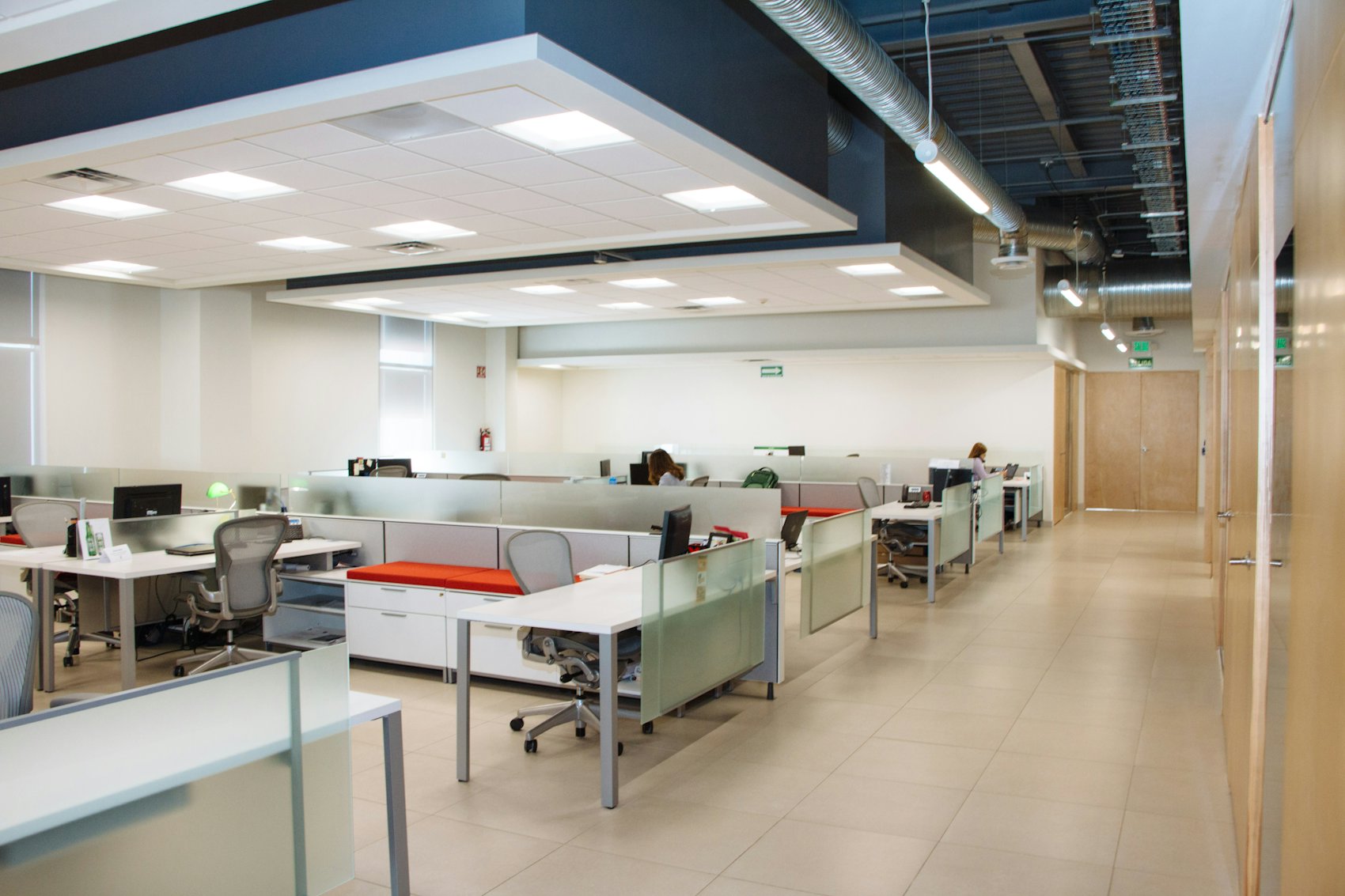 Open office workstations with Herman Miller Aeron chairs